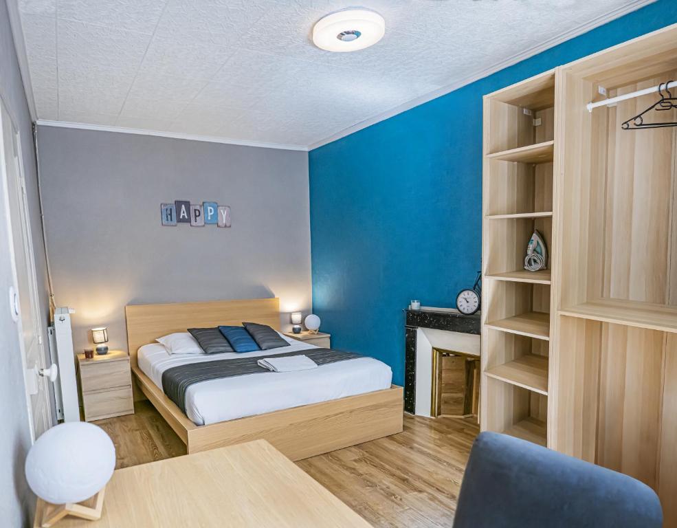Postel nebo postele na pokoji v ubytování Gîte chez Thomas et John