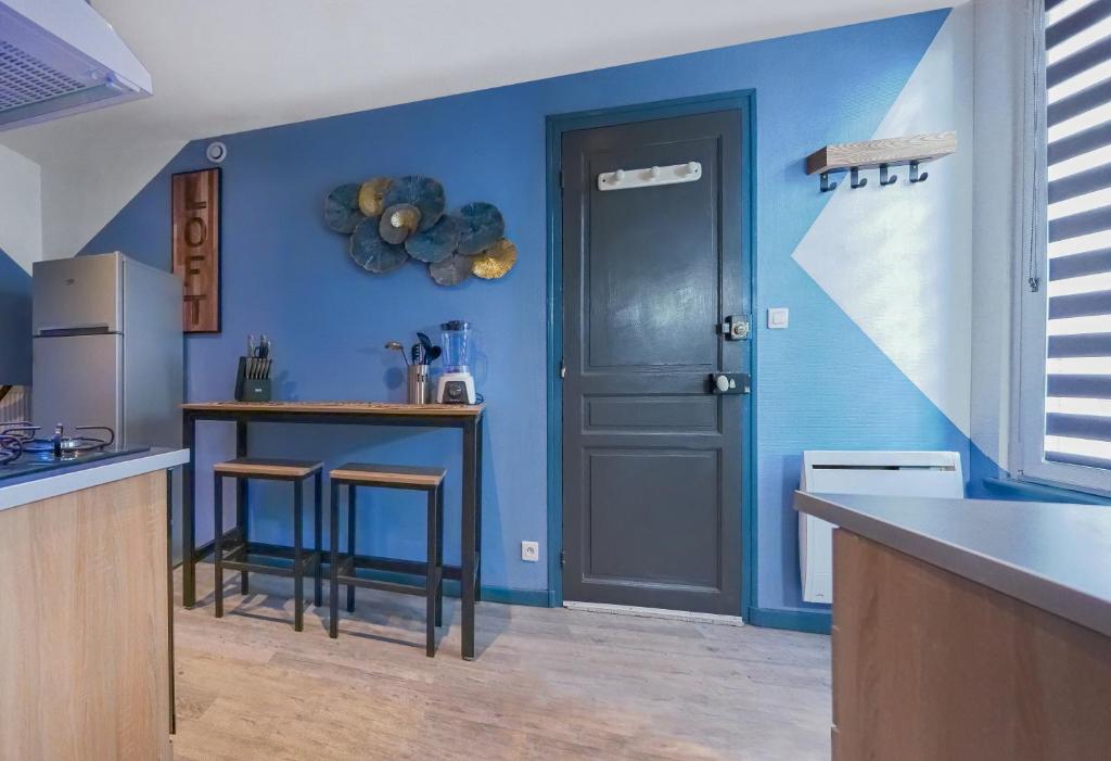 Kuchyň nebo kuchyňský kout v ubytování Gîte chez Thomas et John