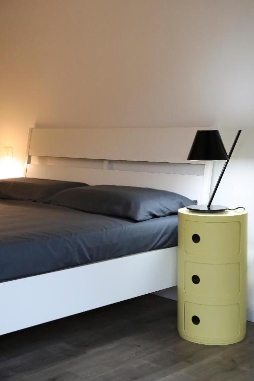Łóżko lub łóżka w pokoju w obiekcie Kimimoel House