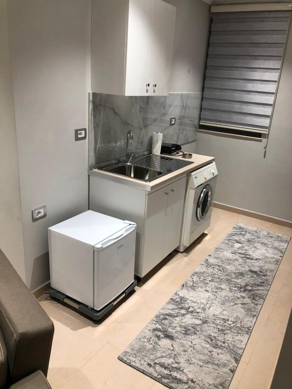 Kuchyň nebo kuchyňský kout v ubytování Cozy GuestHome Korce