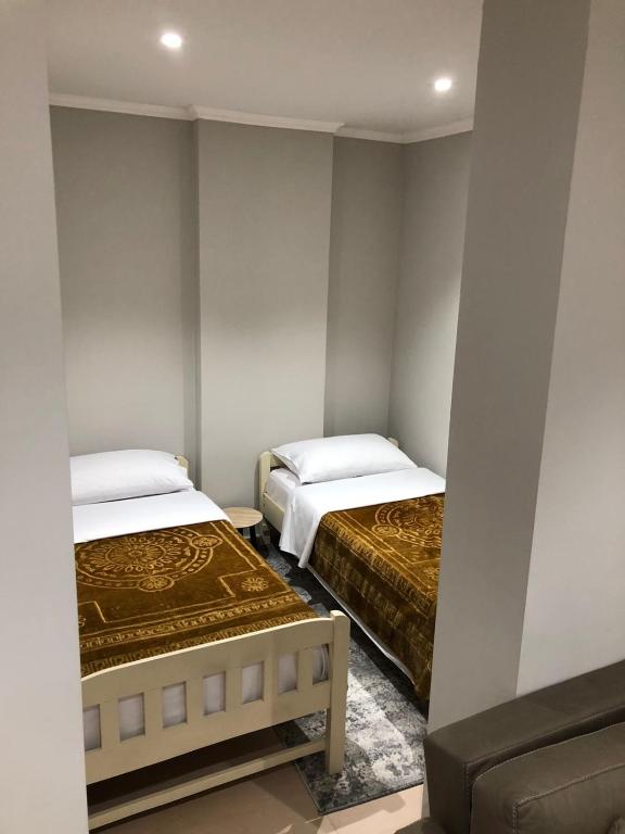 Postel nebo postele na pokoji v ubytování Cozy GuestHome Korce
