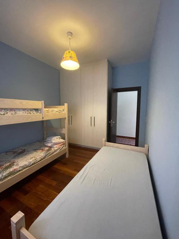 Łóżko lub łóżka w pokoju w obiekcie Stymfalia Cozy Village Guesthouse