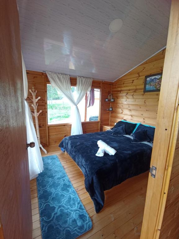 Postel nebo postele na pokoji v ubytování Cabaña La Granja tomine