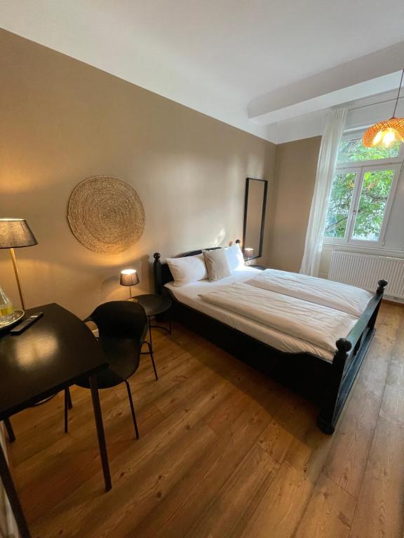 Postel nebo postele na pokoji v ubytování AUERSTEIN-Hotels auerstein & auerstein-mono