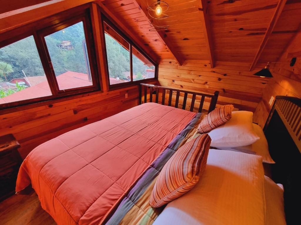 Postel nebo postele na pokoji v ubytování Villas de los Pinos 3