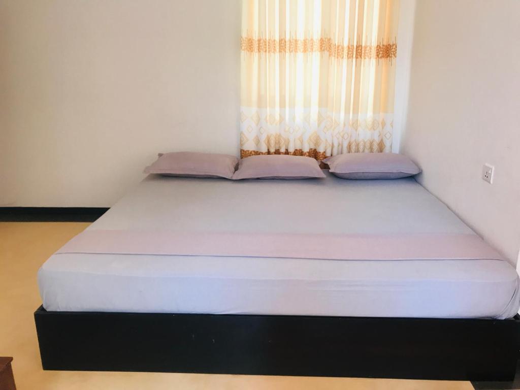 Postel nebo postele na pokoji v ubytování Hotel Ganthera Kataragama