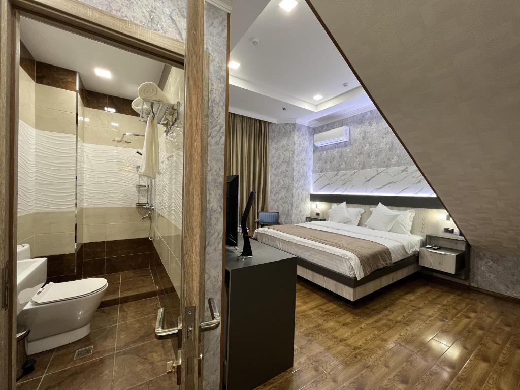 Koupelna v ubytování Ada Hotel
