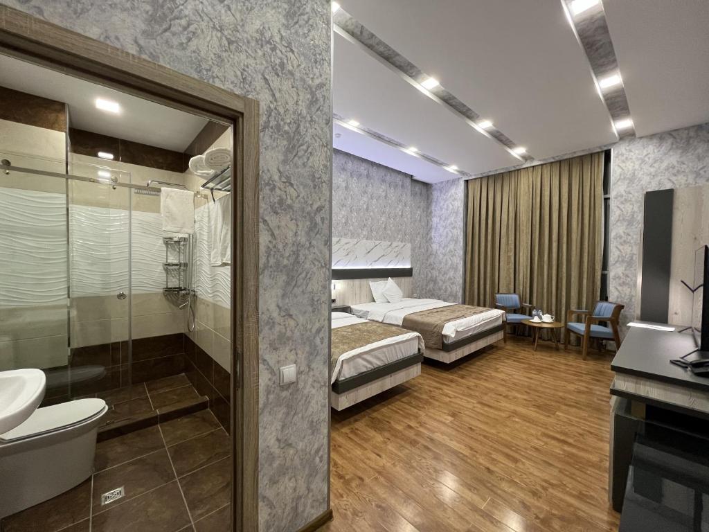 Koupelna v ubytování Ada Hotel