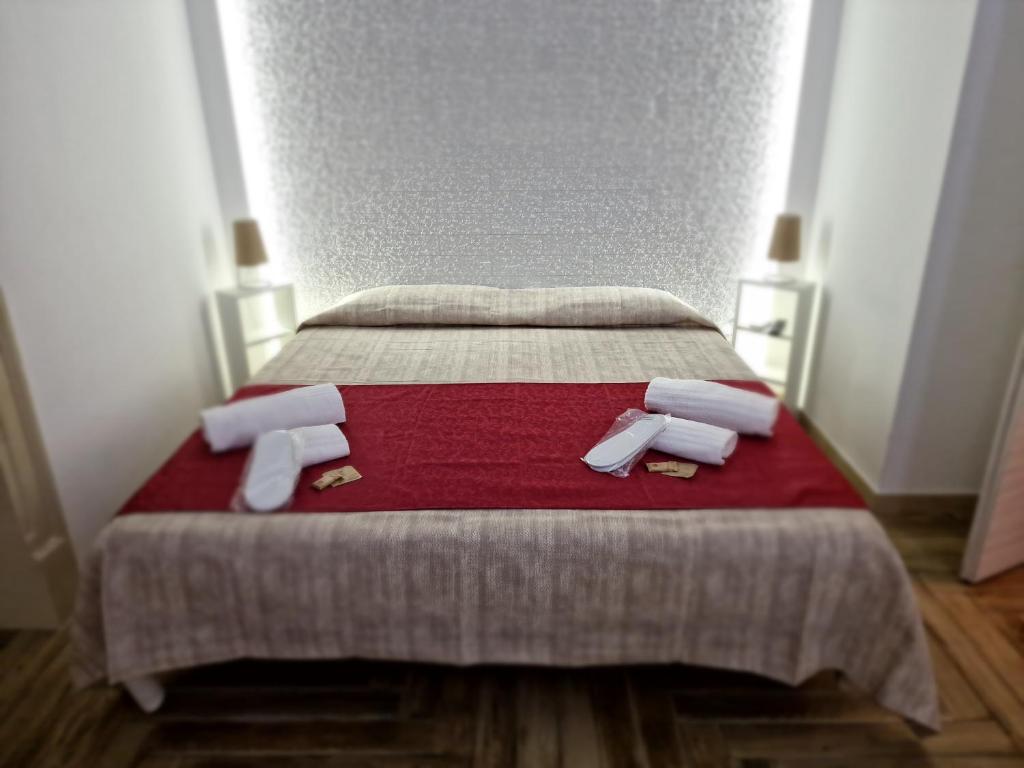 Posteľ alebo postele v izbe v ubytovaní Calypso Il Binario Elegance