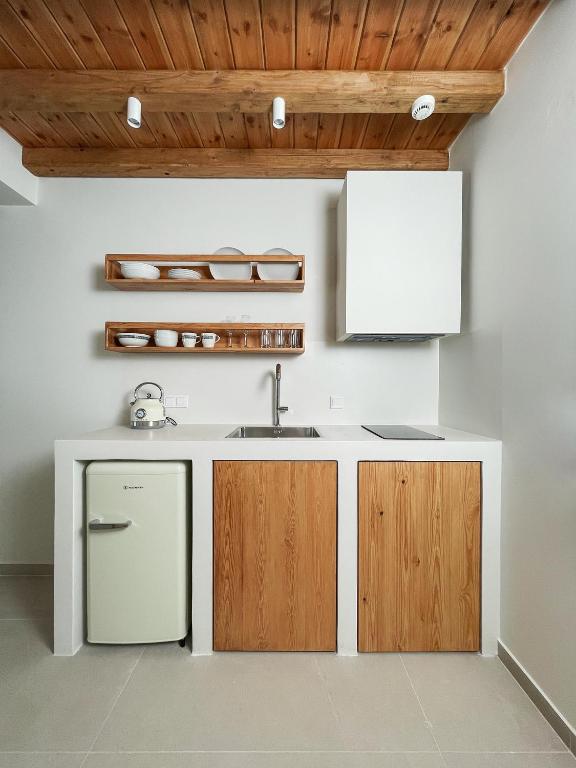 A kitchen or kitchenette at Triantafilia Guesthouse