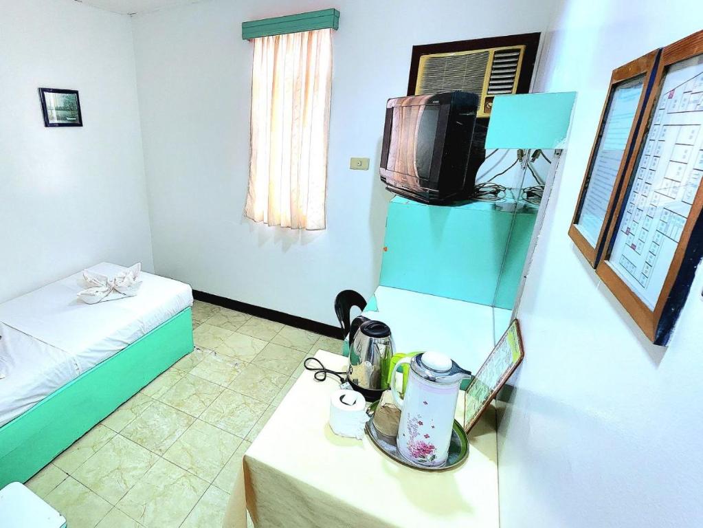 Postel nebo postele na pokoji v ubytování Demiren Hotel