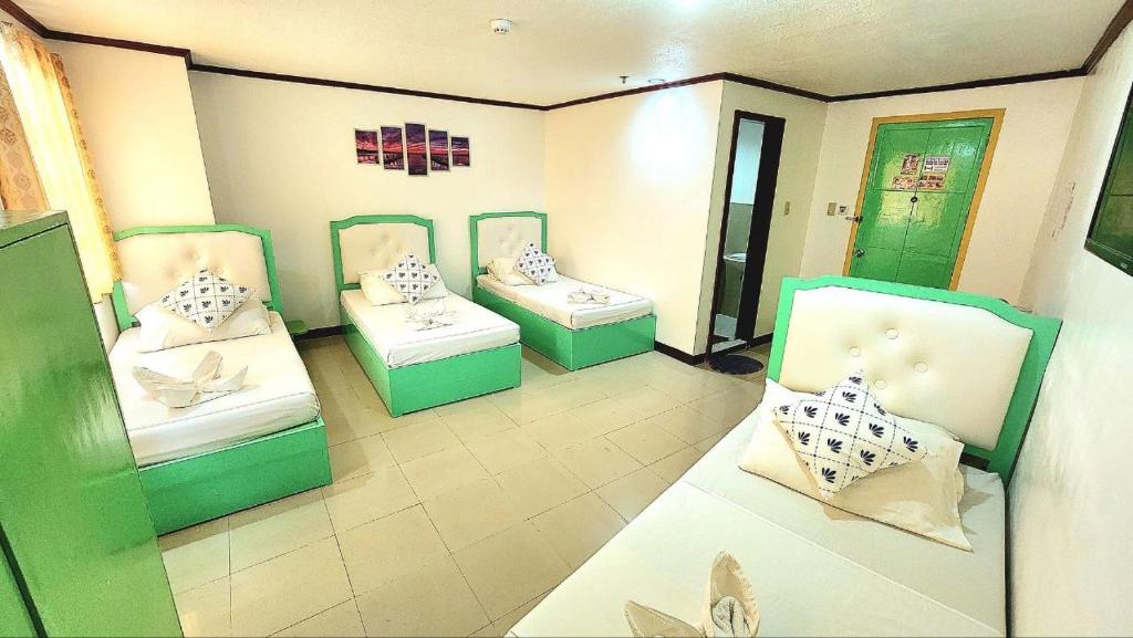 Postel nebo postele na pokoji v ubytování Demiren Hotel
