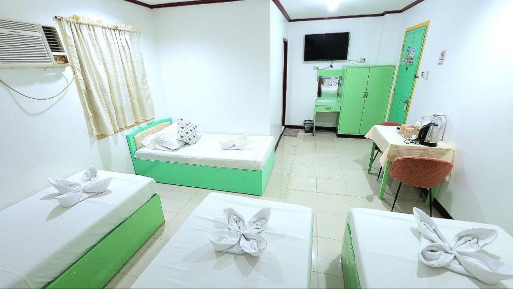 Postel nebo postele na pokoji v ubytování Demiren Hotel