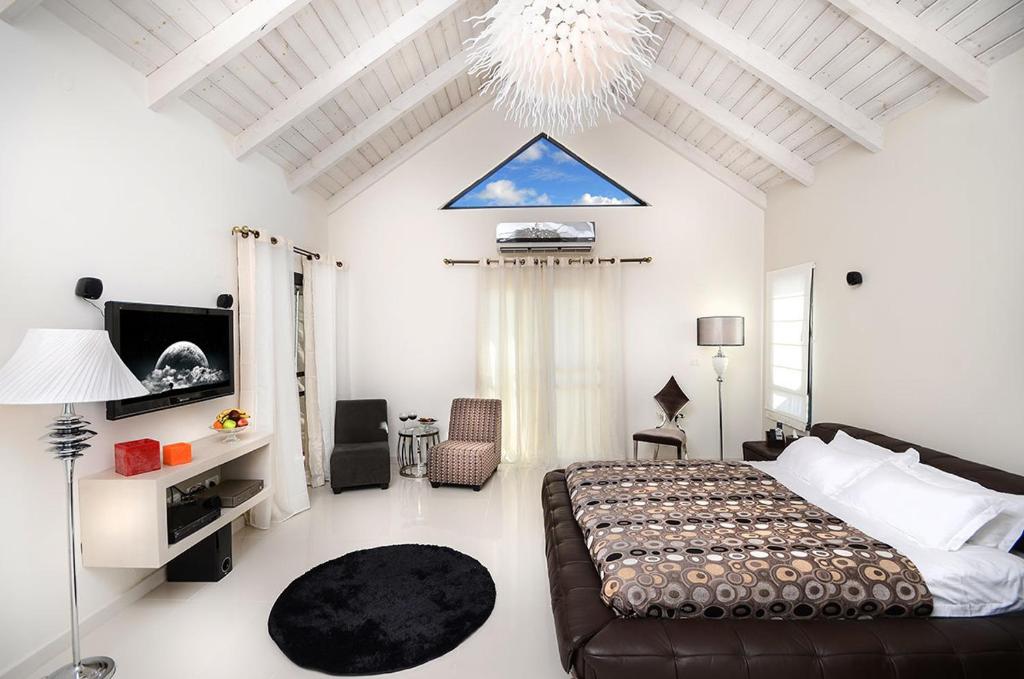 Ένα ή περισσότερα κρεβάτια σε δωμάτιο στο Luna Bianca