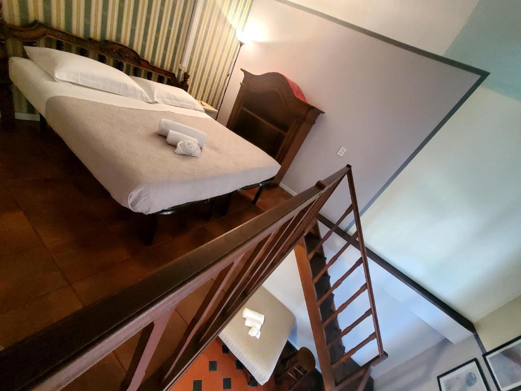 Postel nebo postele na pokoji v ubytování Hotel Fedora