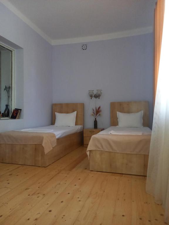 Postel nebo postele na pokoji v ubytování SELINA GUEST HOUSE