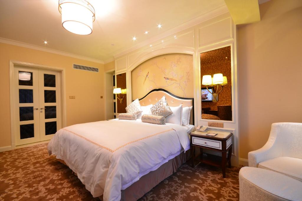 Postel nebo postele na pokoji v ubytování Urban Island Hotel Shanghai