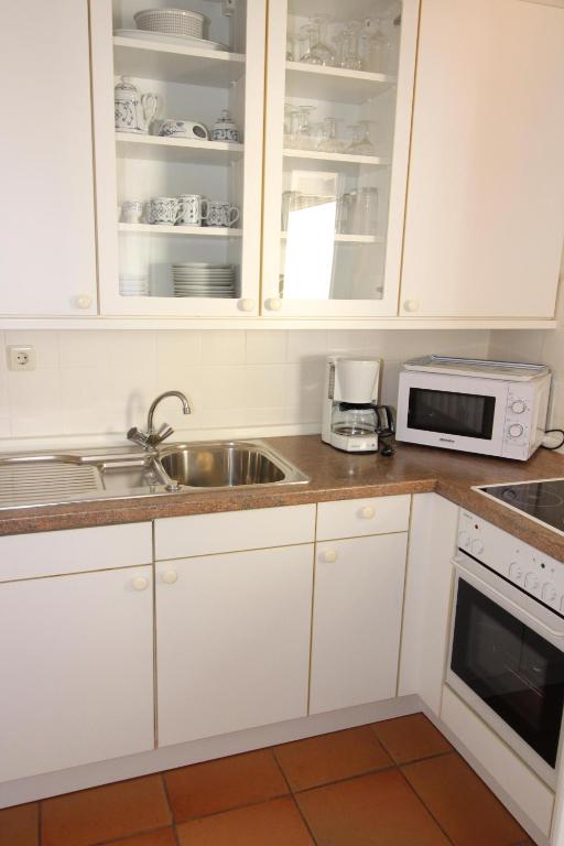 Kuchyň nebo kuchyňský kout v ubytování Haus Nordseeresidenz Wohnung 35
