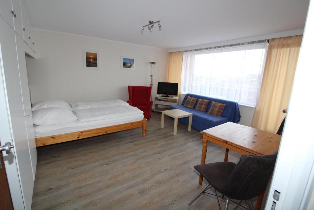 Postel nebo postele na pokoji v ubytování Haus Nordseeresidenz Wohnung 94