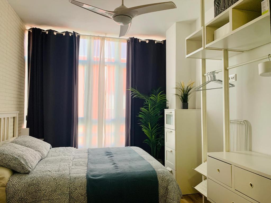Postel nebo postele na pokoji v ubytování Palm apartment