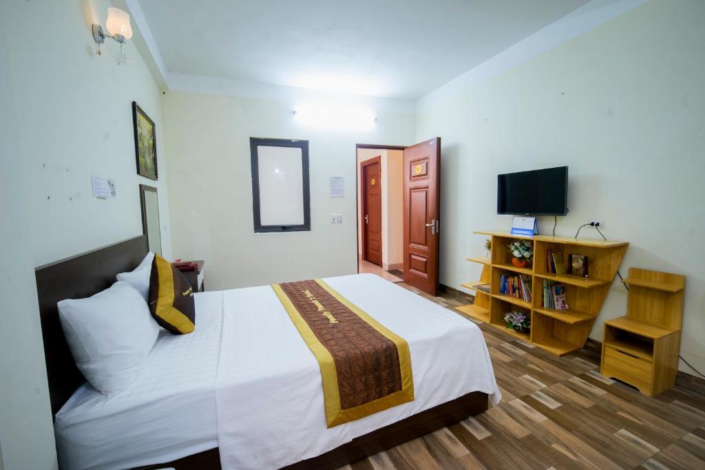 Postel nebo postele na pokoji v ubytování Family Transit 2 Hotel