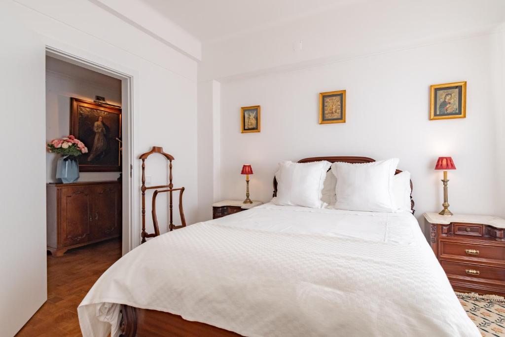Postel nebo postele na pokoji v ubytování Casa da Avó Bia