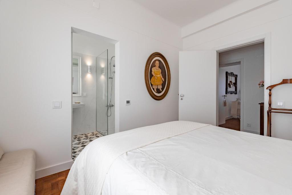 Postel nebo postele na pokoji v ubytování Casa da Avó Bia
