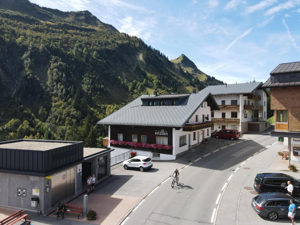 an aerial view of a town with mountains in the background at Hotel Garni Enzian in Damuls
