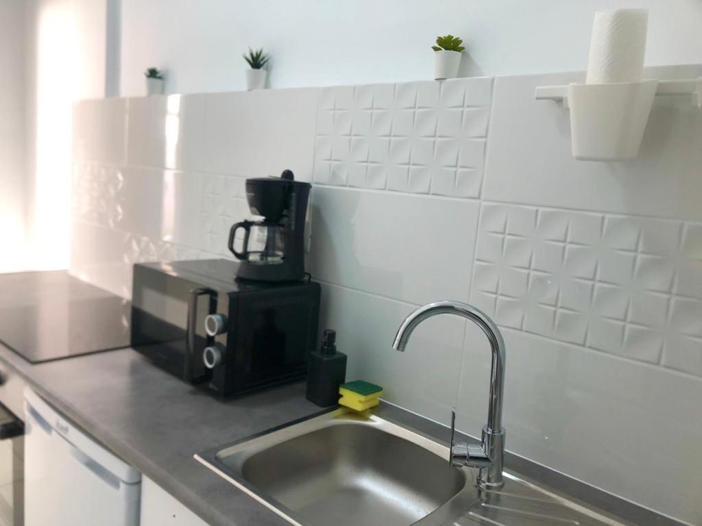 a kitchen counter with a sink and a coffee maker at Chayofa Hills - 2 Bedroom Apartment with Ocean Views and Air-condition A in Chayofa