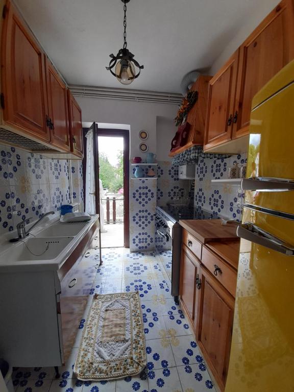 Kuchyň nebo kuchyňský kout v ubytování Casa vacanze Daniela
