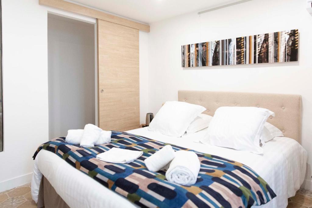 Postel nebo postele na pokoji v ubytování Hotel Galla Placidia