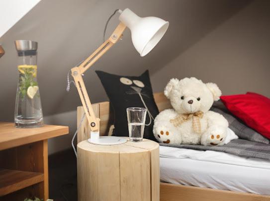 Posteľ alebo postele v izbe v ubytovaní Apartamenty U Harrego I Przy Stawie Spa z klimatyzacją, balia, sauna, ogrodem i parkingiem