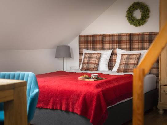 Posteľ alebo postele v izbe v ubytovaní Apartamenty U Harrego I Przy Stawie Spa z klimatyzacją, balia, sauna, ogrodem i parkingiem