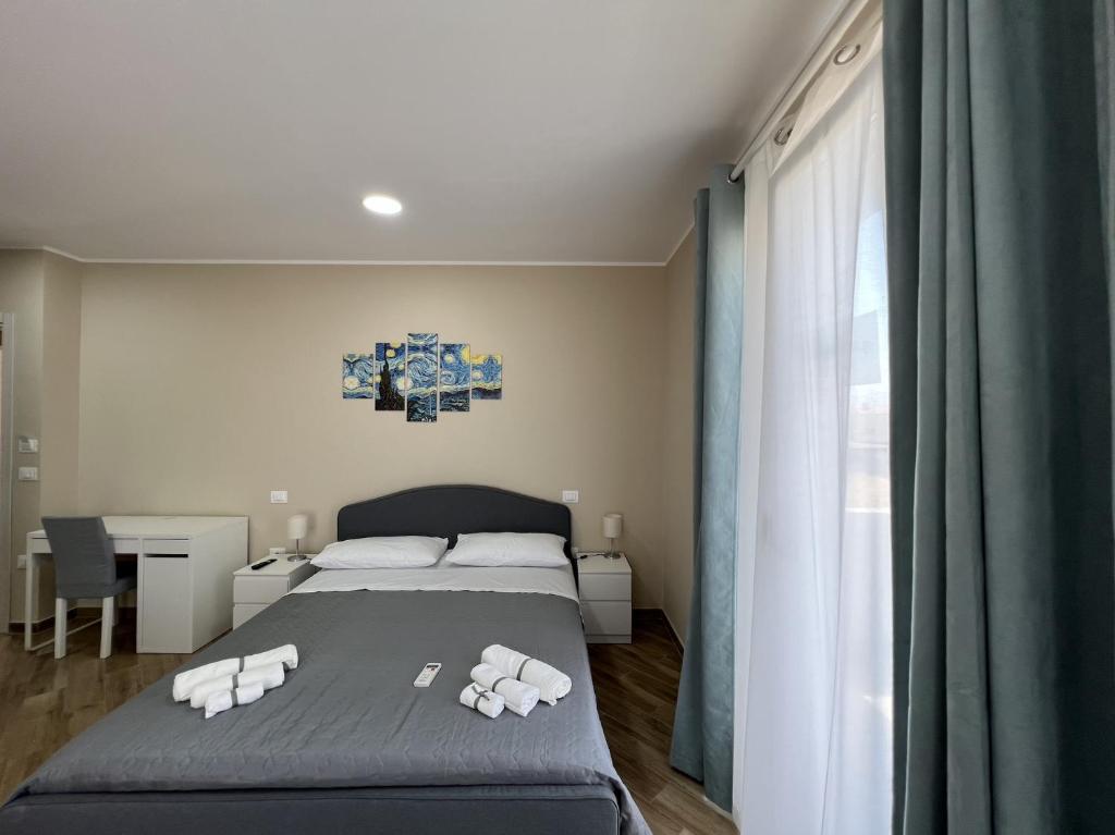 Postel nebo postele na pokoji v ubytování B&B Ranieri