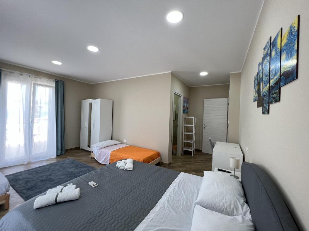 Postel nebo postele na pokoji v ubytování B&B Ranieri