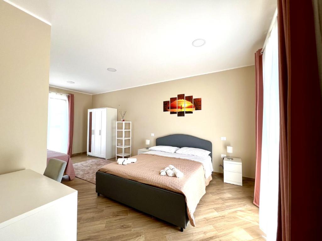 Postel nebo postele na pokoji v ubytování B&B Ranieri