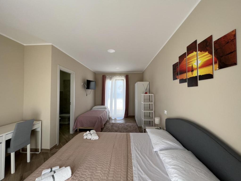 Postel nebo postele na pokoji v ubytování B&B Ranieri