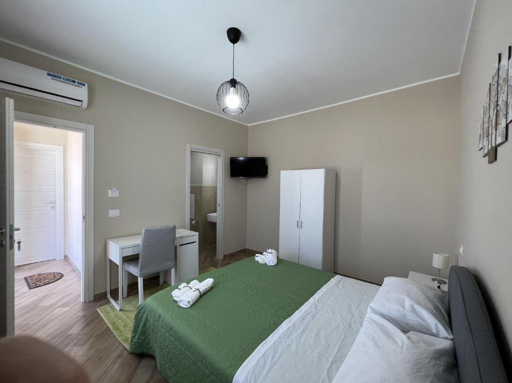 Postel nebo postele na pokoji v ubytování B&B Ranieri