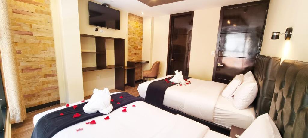 Postel nebo postele na pokoji v ubytování Hotel Raices Machupicchu