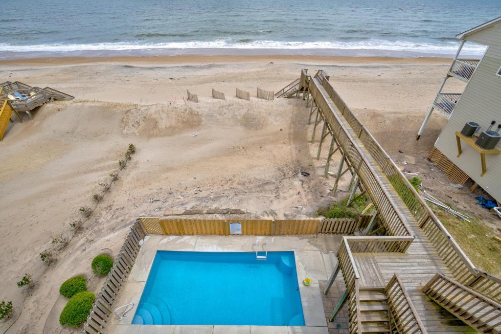 an overhead view of a swimming pool on the beach at The Lazy Beagle in North Topsail Beach