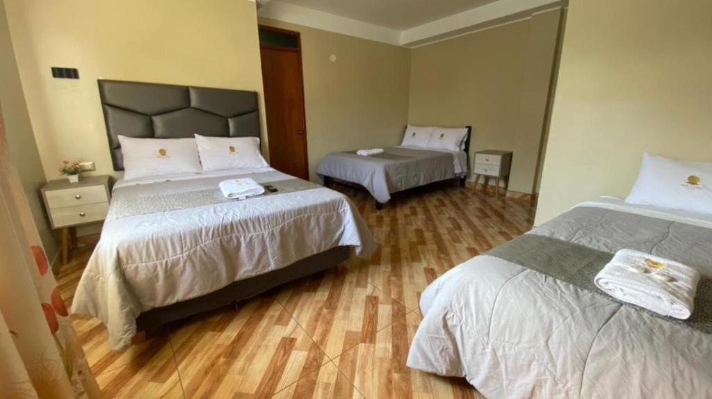 Postel nebo postele na pokoji v ubytování HOTEL MAR Y LAGO