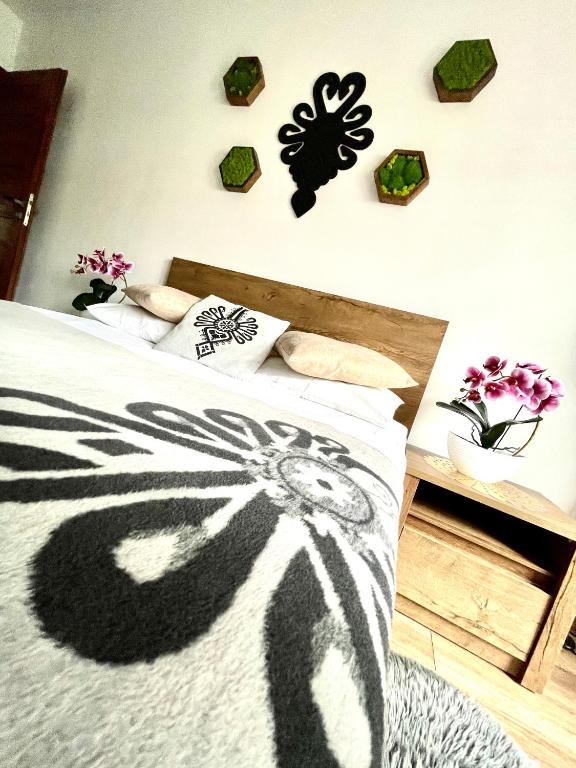Posteľ alebo postele v izbe v ubytovaní Apartament Krupówki Centrum