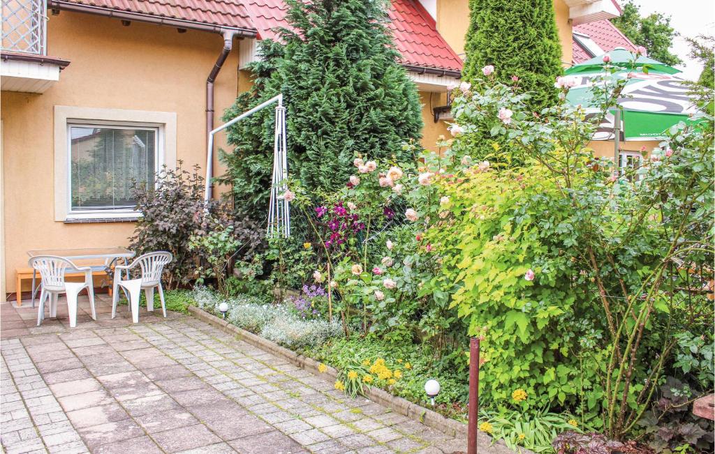 Vonkajšia záhrada v ubytovaní Holiday Home Rewal Olszynowa Ii