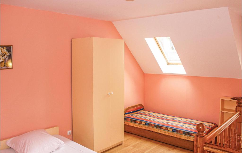 Posteľ alebo postele v izbe v ubytovaní Holiday Home Rewal Olszynowa Ii