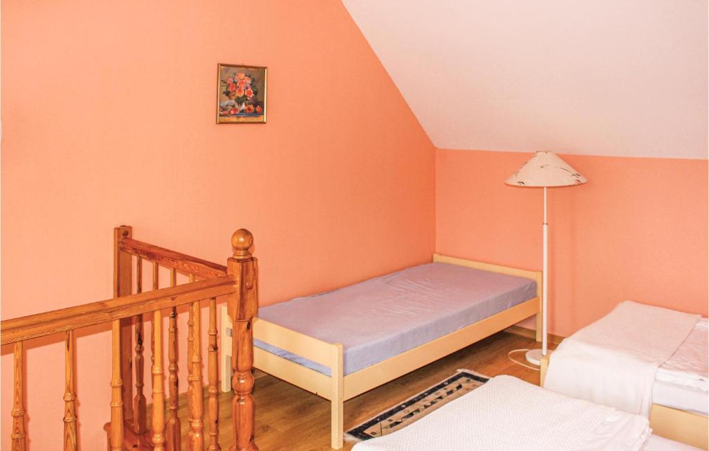 Posteľ alebo postele v izbe v ubytovaní Holiday Home Rewal Olszynowa Ii
