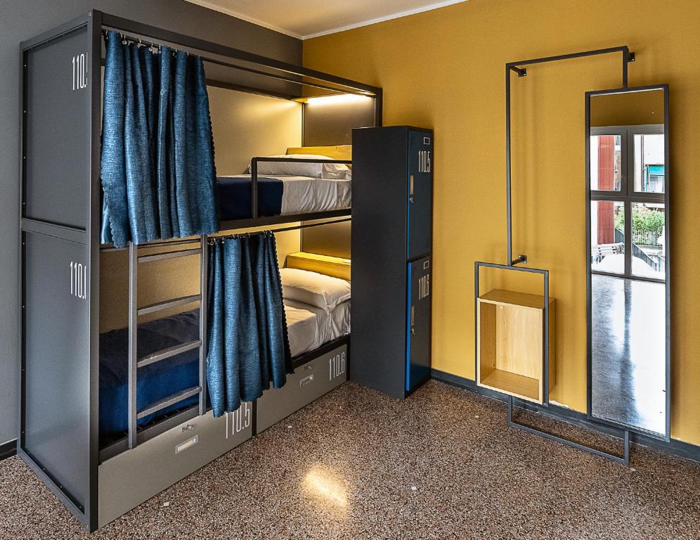 Postel nebo postele na pokoji v ubytování Marathon Hostel
