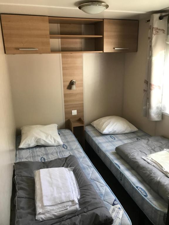 Posteľ alebo postele v izbe v ubytovaní MH-6 PERS-3 CH-2 SDB-lave vaisselle-lave linge - WIFI GARANTIE - grande terrasse