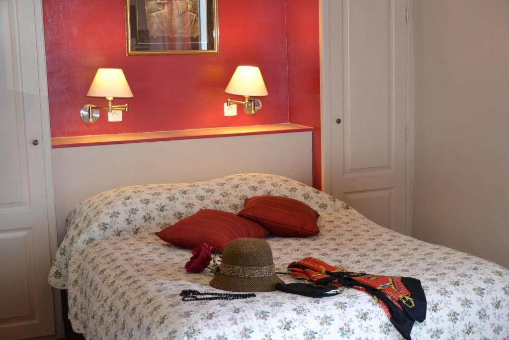Postel nebo postele na pokoji v ubytování Hotellerie de l'Esplanade