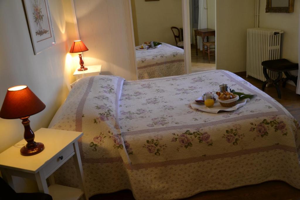 Postel nebo postele na pokoji v ubytování Hotellerie de l'Esplanade