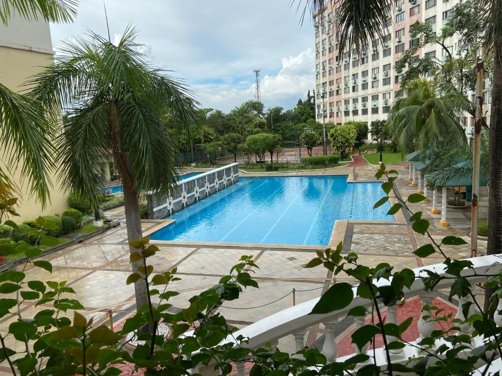 Bazén v ubytování IV’s Condo w/ Netflix, Wifi & Karaoke nebo v jeho okolí